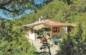 a small house in the middle of a mountain at Beautiful Home In Teyssieres With 2 Bedrooms And Outdoor Swimming Pool in Teyssières