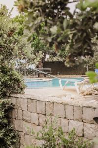 Bazén v ubytování Hotel Neptuno nebo v jeho okolí