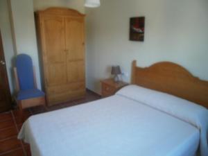 Postel nebo postele na pokoji v ubytování Casa Detrés