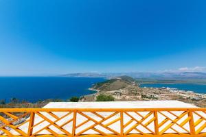 a view of a body of water from a mountain at Santa Oliva Suites in Ksamil