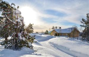 
Four-Bedroom Holiday Home in Evje om vinteren
