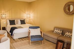 Postel nebo postele na pokoji v ubytování Hotel Neptuno