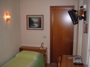 Albergo Luca 객실 침대