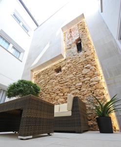 A seating area at Apartamentos Turísticos Mirablanc