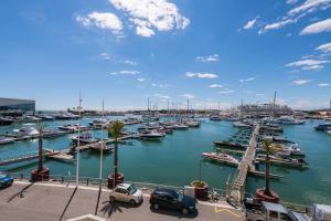 a marina filled with lots of boats in the water at LovelyStay - Two Bedroom Duplex at Vilamoura Marina in Vilamoura