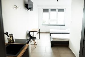 TV a/nebo společenská místnost v ubytování Orange Tree Hotel