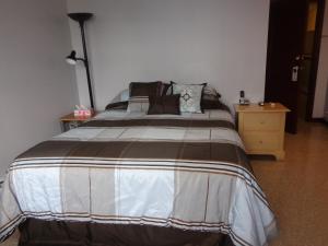 Postel nebo postele na pokoji v ubytování Happy Motel