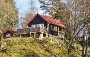 a house on top of a hill at Nice Home In Frde I Hordaland With House Sea View in Førde