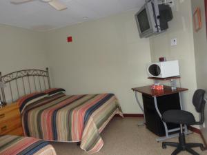 TV a/nebo společenská místnost v ubytování Happy Motel