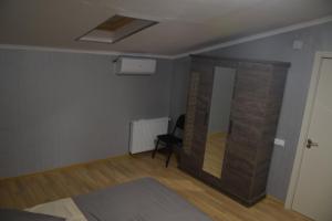 Postel nebo postele na pokoji v ubytování gogoli family hotel