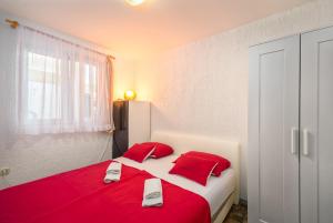 Postel nebo postele na pokoji v ubytování Apartments Marko