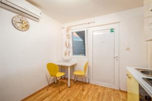 Kuchyň nebo kuchyňský kout v ubytování Apartments Marko