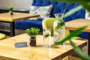 A seating area at City Avenue Hotel by HMG-Free Parking-Free Wi-Fi