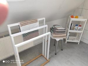 Postel nebo postele na pokoji v ubytování Apartment unterm Dach