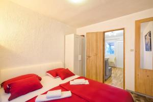 Postel nebo postele na pokoji v ubytování Apartments Marko