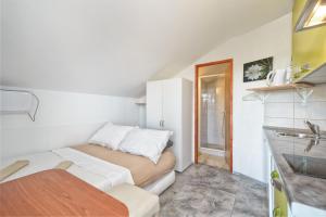 Postel nebo postele na pokoji v ubytování Apartments Marko