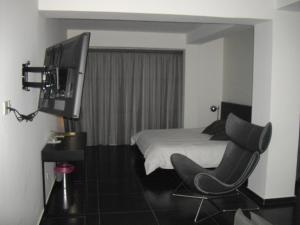 Voodi või voodid majutusasutuse Crystal Hotel toas