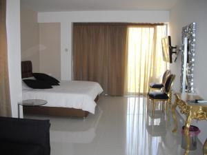 Voodi või voodid majutusasutuse Crystal Hotel toas