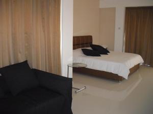 Voodi või voodid majutusasutuse Crystal Hotel toas