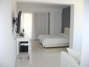 Voodi või voodid majutusasutuse Crystal Hotel toas