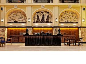 Um restaurante ou outro lugar para comer em Grandezza Hotel Luxury Palace