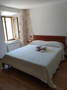 Postel nebo postele na pokoji v ubytování Historical Domus
