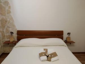 Postel nebo postele na pokoji v ubytování Historical Domus