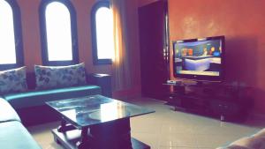 TV a/nebo společenská místnost v ubytování Résidence Somia Plage