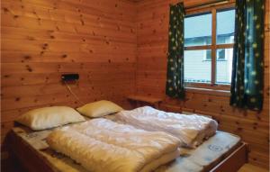 Ένα ή περισσότερα κρεβάτια σε δωμάτιο στο 3 Bedroom Nice Home In Vallavik