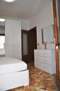 A bed or beds in a room at VIALE REPUBBLICA 307 2