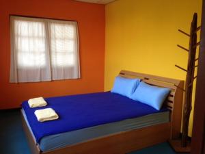 Postel nebo postele na pokoji v ubytování Just Chill Inn