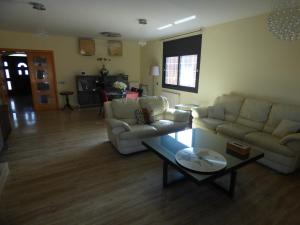Posezení v ubytování Chalet moderno con PISCINA en Calafell