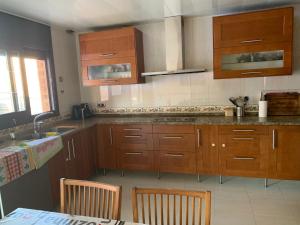 Kuchyň nebo kuchyňský kout v ubytování Chalet moderno con PISCINA en Calafell