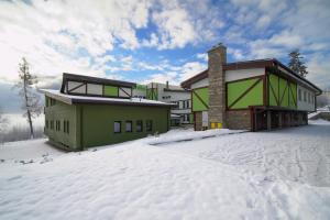 Apartmanovy dom Familia Smokovec during the winter