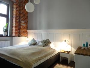 Posteľ alebo postele v izbe v ubytovaní Good Time Aparthotel