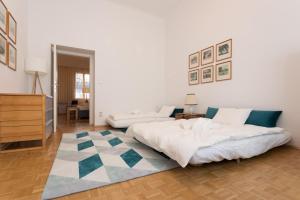 Łóżko lub łóżka w pokoju w obiekcie Vintage Design Apartment
