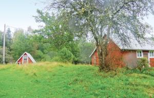 O grădină în afara Holiday Home Brändeborg Ryd
