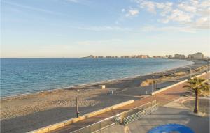 a view of a beach with the ocean and buildings at Beach Front Apartment in San Blas