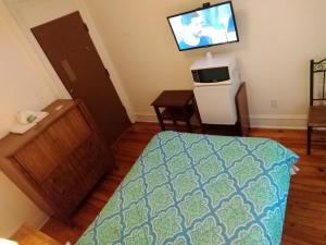 TV a/nebo společenská místnost v ubytování Cappuccio Hotel