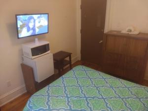TV a/nebo společenská místnost v ubytování Cappuccio Hotel