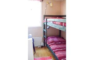 Postel nebo postele na pokoji v ubytování 2 Bedroom Gorgeous Home In Mnsters