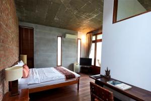 Voodi või voodid majutusasutuse Chang House toas