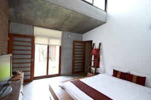 Voodi või voodid majutusasutuse Chang House toas