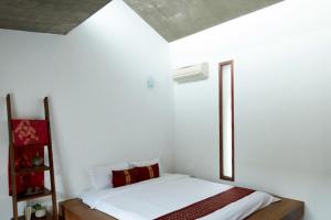 Voodi või voodid majutusasutuse Chang House toas
