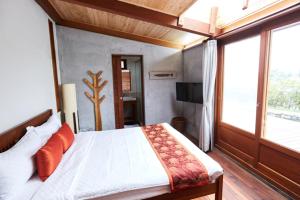 Voodi või voodid majutusasutuse Chang House toas