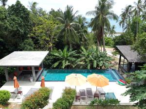A view of the pool at Padel Phangan Suite or nearby