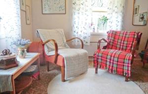 O zonă de relaxare la Holiday Home Brändeborg Ryd +6 fotografii