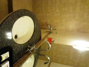 Koupelna v ubytování Nestor Hotel, Mumbai