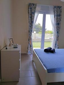 Postel nebo postele na pokoji v ubytování Mango apartment