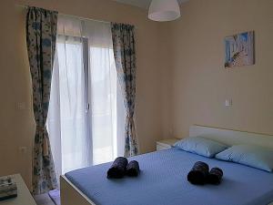 Postel nebo postele na pokoji v ubytování Mango apartment